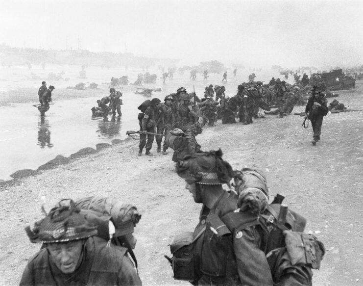 British troops standing on Sword Beach