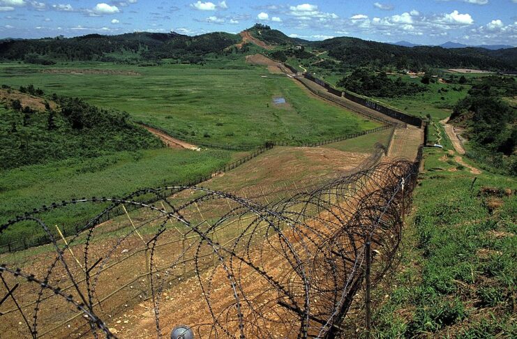 Barbed wire fence running along the Demilitarized Zone (DMZ) between North and South Korea