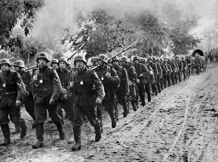 German soldiers walking along a dirt path