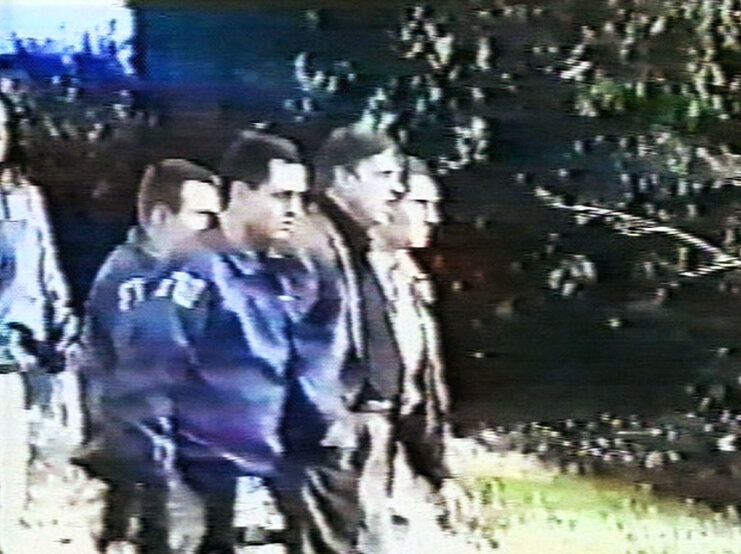 FBI agents escorting Robert Hanssen