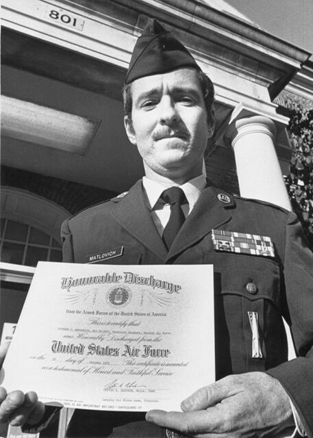 Leonard Matlovich holding his General (Under Honorable Conditions) Discharge papers