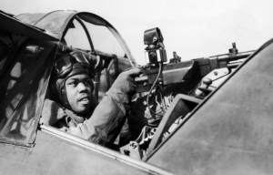 Jamaican air gunner in the cockpit of an Army Cooperation Command aircraft