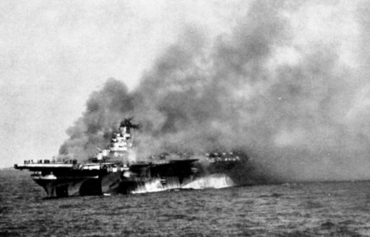 USS Ticonderoga (CV-14) shrouded in smoke