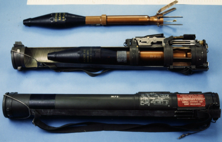 Components of the M72 LAW laid out on a light blue table