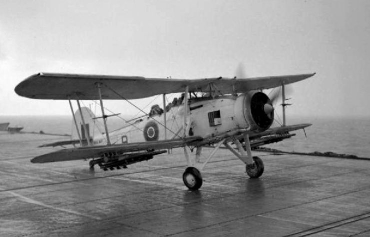 Fairey Swordfish parked on the flight deck of the HMS Tracker (D24)