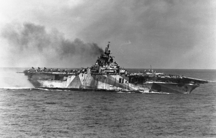 Smoke rising from the USS Ticonderoga (CV-14)