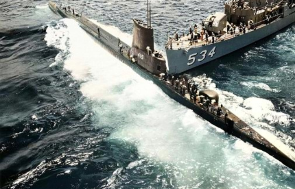 USS Silverstein (DE-534) crashing into the USS Stickleback (SS-415) at sea