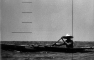 Rufino Baning in a boat, as seen through the scope of the USS Triton (SSRN-586)
