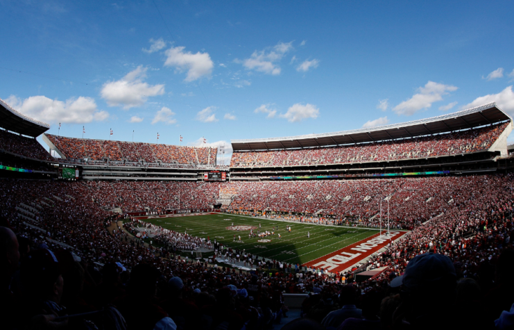 Spectators gathered together around the football field at Bryant-Denny Stadium in Tuscaloosa, Alabama