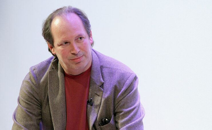 Hans Zimmer sitting on stage