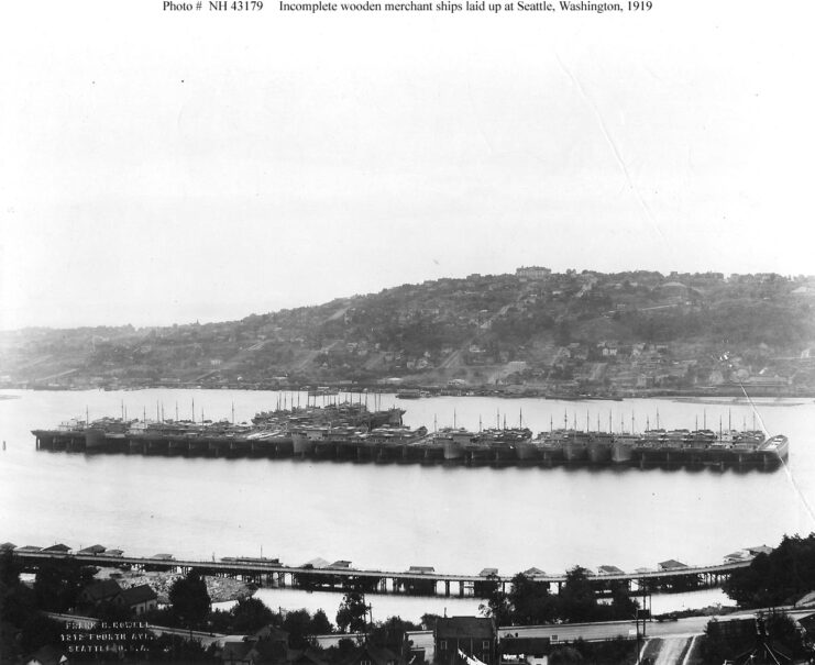 Row of wooden merchant ships off the coast of Seattle, Washington