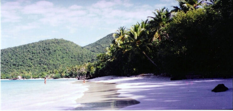 People standing along Oppenheimer Beach, in the Virgin Islands