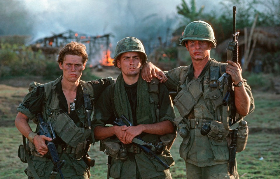 Willem Dafoe, Charlie Sheen and Tom Berenger as Sgt. Elias, Chris Taylor and Staff Sgt. Barnes in 'Platoon'