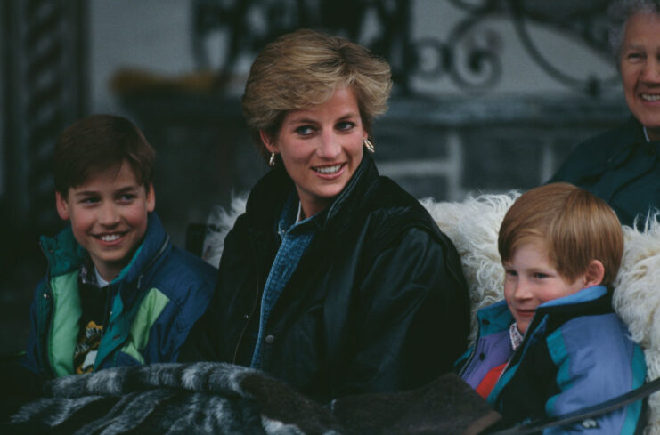 Diana, Princess of Wales sitting with William and Harry