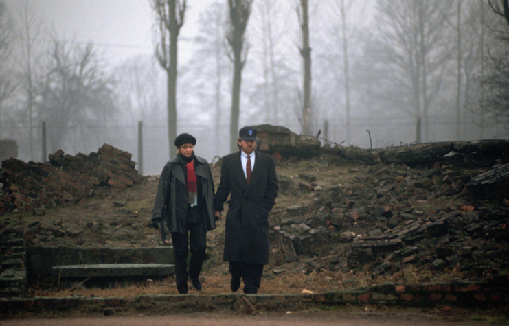 Steven Spielberg and his wife walking the grounds of Auschwitz-Birkenau