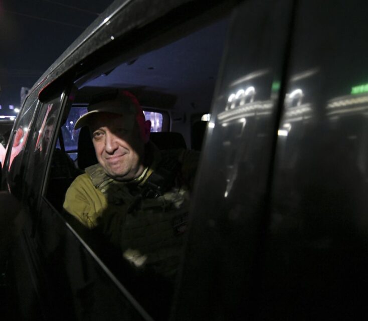 Yevgeny Prigozhin riding as a passenger in a vehicle