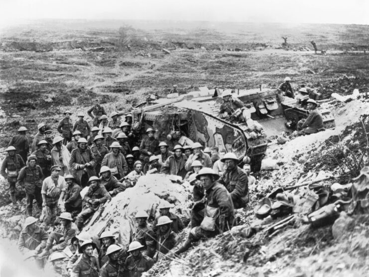 British troops standing with a Mark I tank