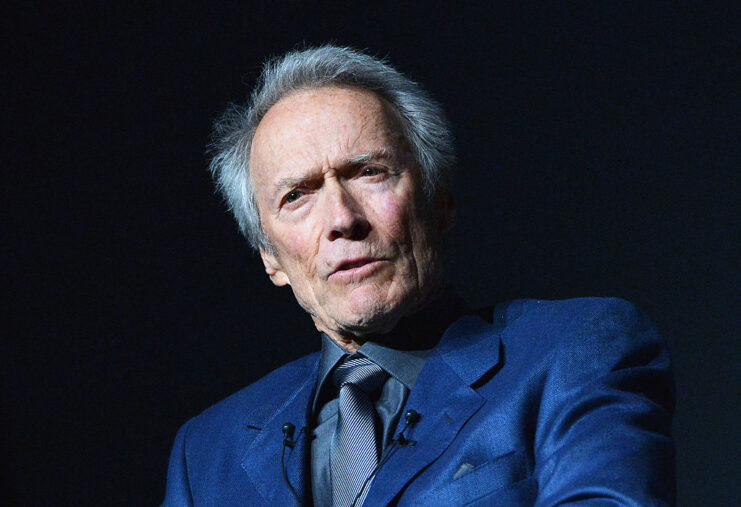 Clint Eastwood wearing a blue suit