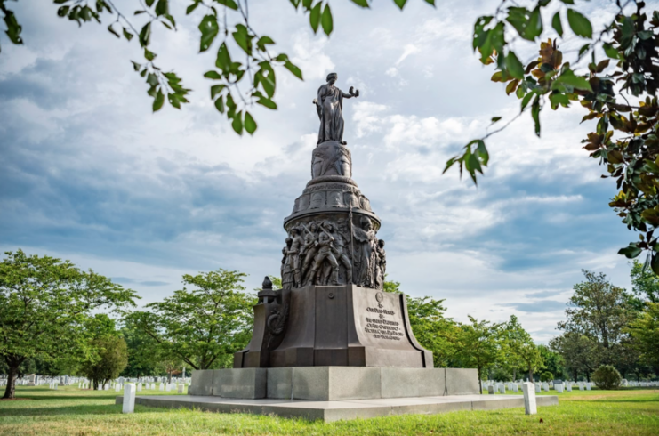 Confederate Memorial standing above Confederate graves at Arlington National Cemetery