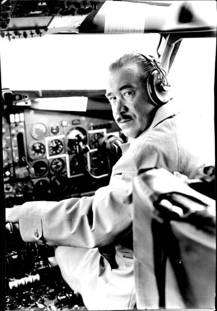 Adolf Galland sitting at the controls of an airplane