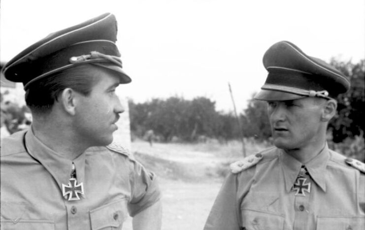 Adolf Galland and Günther Lützow standing together outside