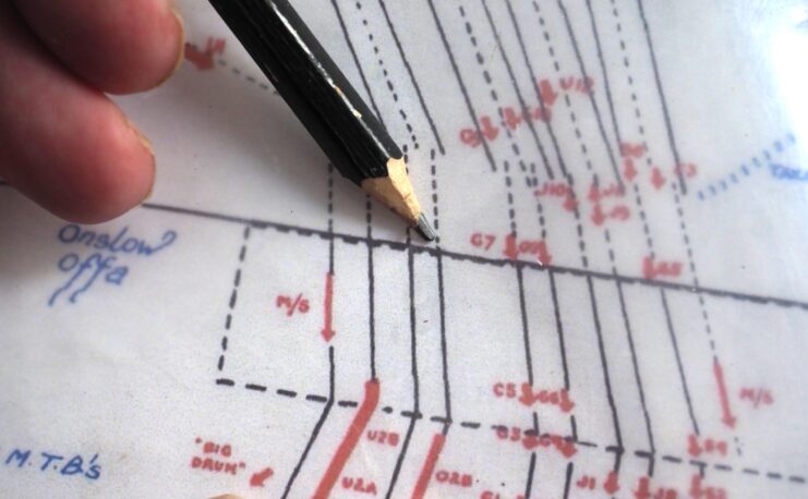 Pencil pointing at the coordinates where the HMS Medusa (A353) positioned herself for D-Day