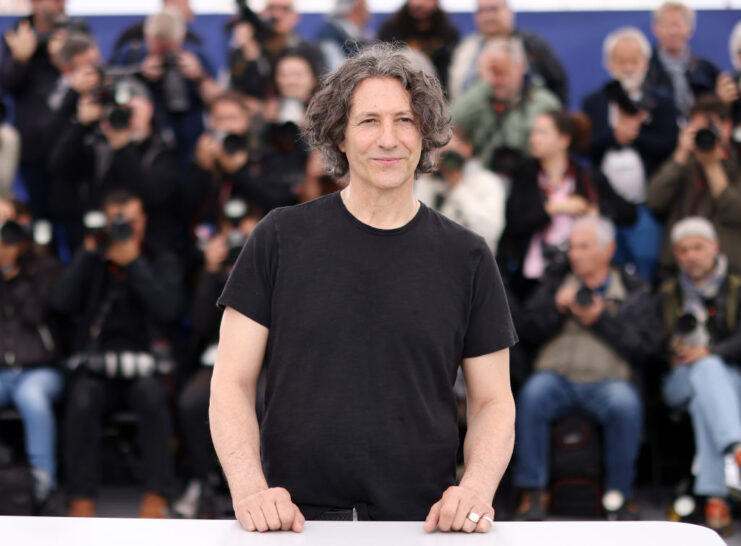 Jonathan Glazer standing on a red carpet