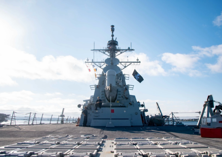 Deck of the USS Kidd (DDG-100), with the Jolly Roger flying