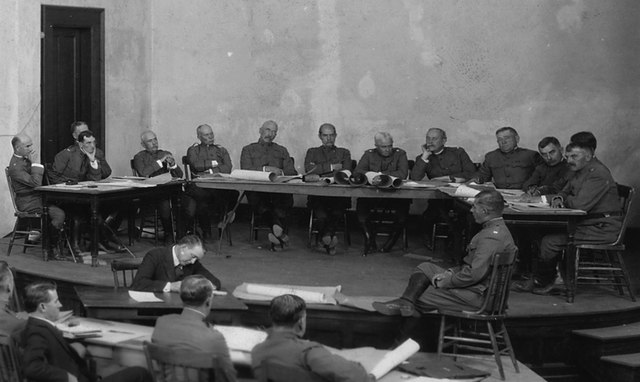 Buffalo Soldiers sitting in a courtroom with US Army officials