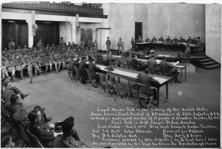 Buffalo Soldiers standing in a courtroom with US Army officials