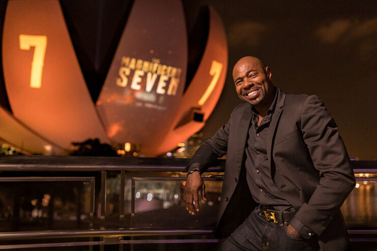 Antoine Fuqua leaning against a balcony barrier