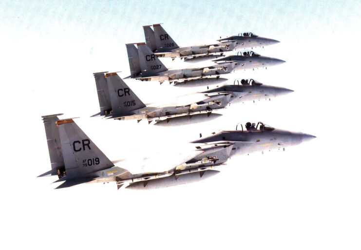 Four McDonnell Douglas F-15C-24-MC Eagles in flight