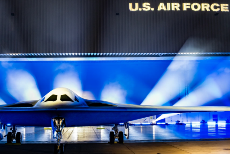 Northrop Grumman B-21 Raider parked on a stage