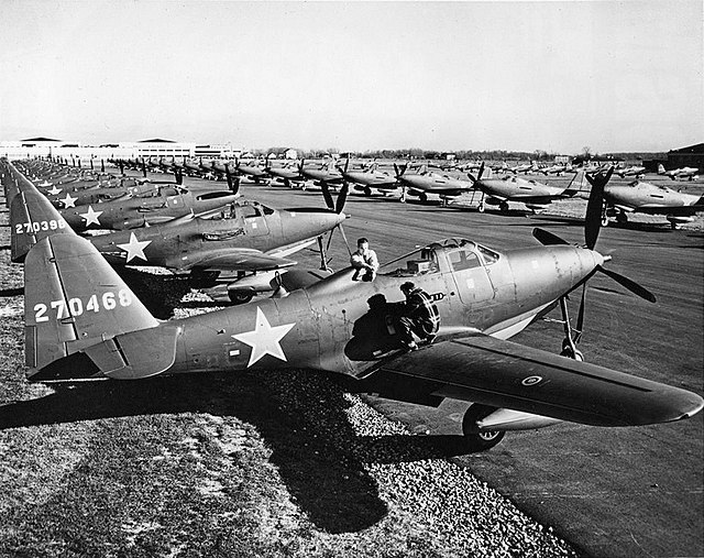 Bell P-63A Kingcobras parked along a runway