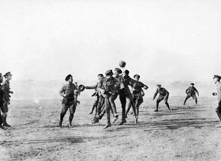 British troops going in to head a football (soccer ball)