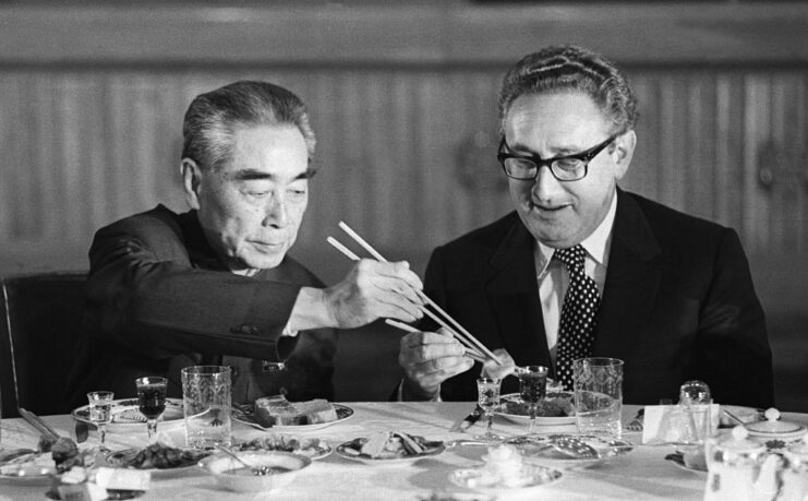 Zhou Enlai and Henry Kissinger eating a meal together