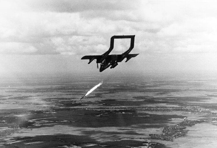 North American Rockwell OV-10A Bronco firing a rocket from the air