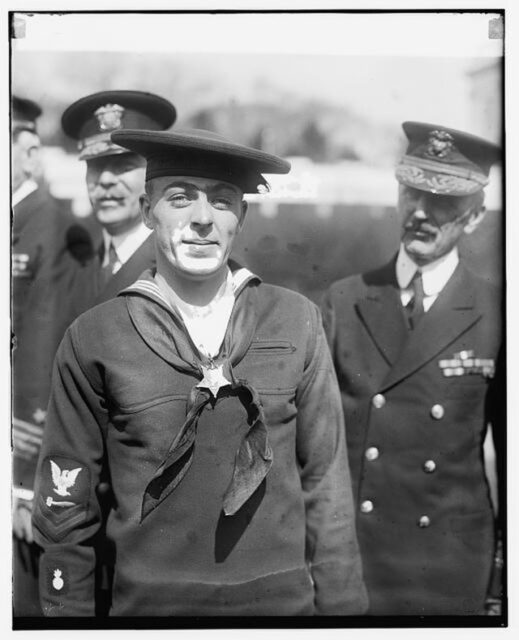 Henry Breault with the Medal of Honor around his neck