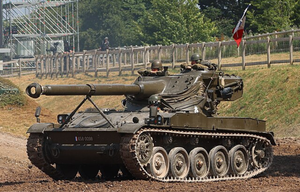 AMX-13 driving around a dirt track