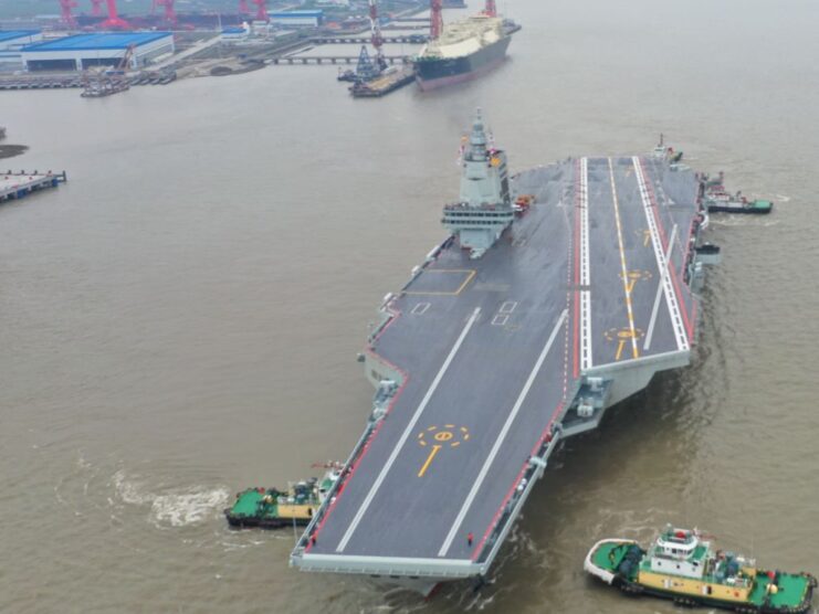 Aerial view of the Type 003 Fujian leaving port
