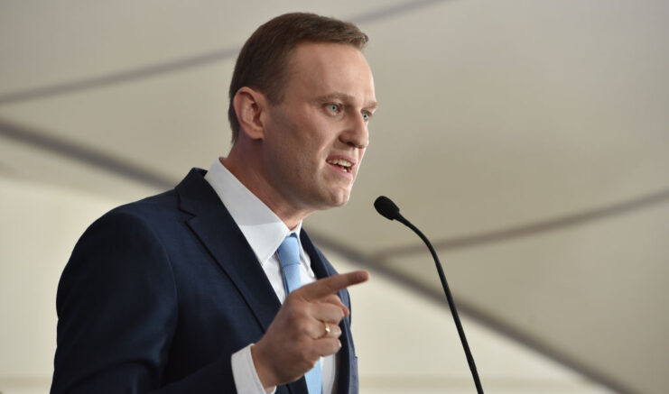 Alexei Navalny speaking into a microphone