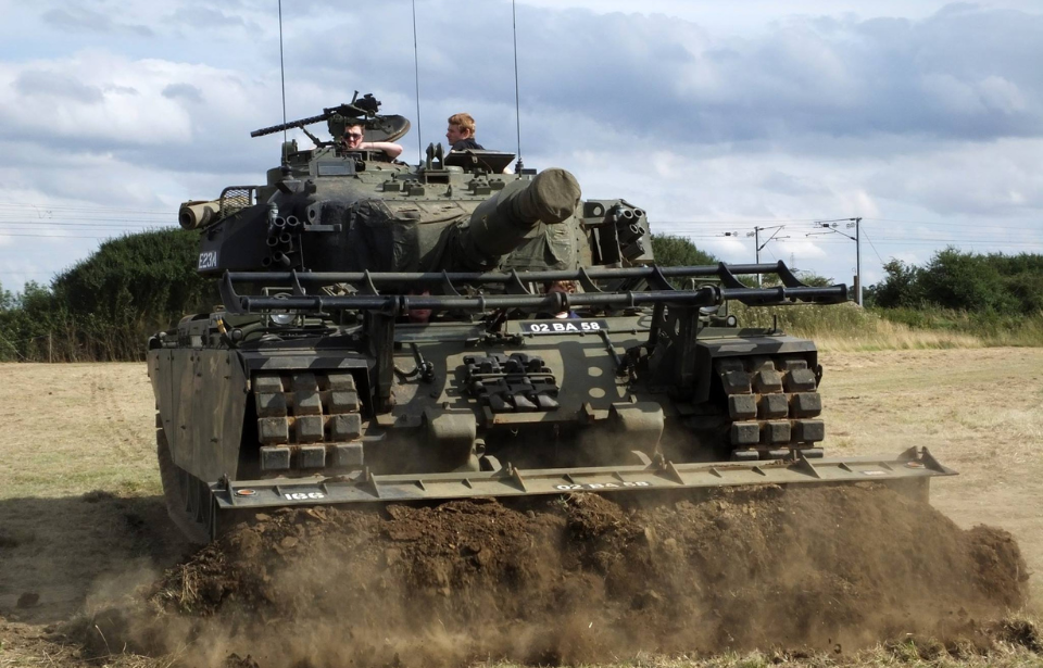 Centurion FV4003 AVRE driving through a field