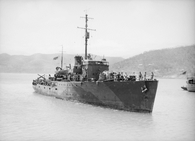 HMAS Armidale (J240) anchored in a harbor