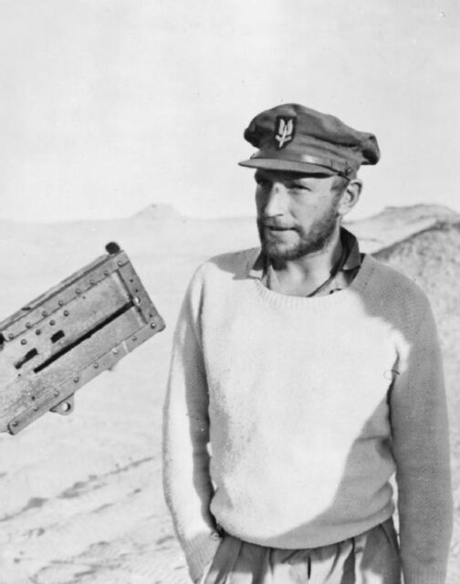 Paddy Mayne standing in the desert