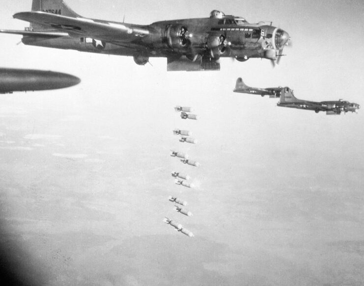 Boeing F-17 Flying Fortress dropping bombs mid-flight