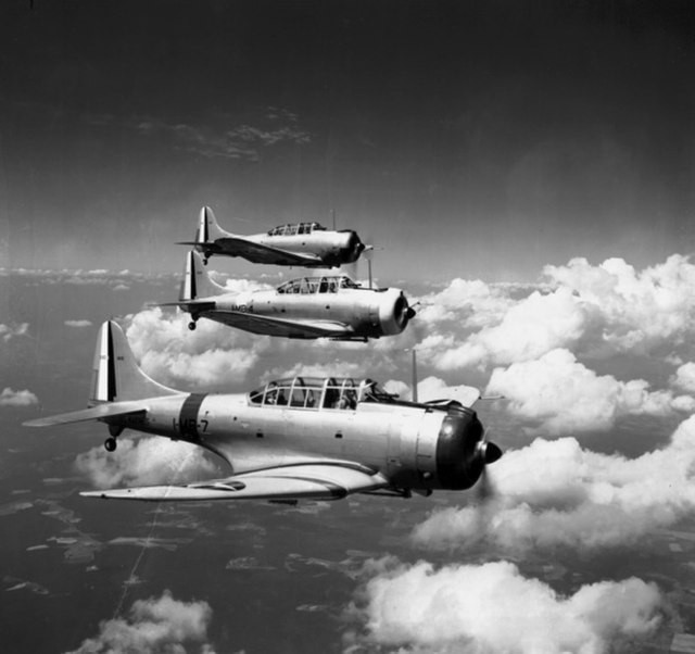 Three Douglas SBD Dauntless dive bombers in flight