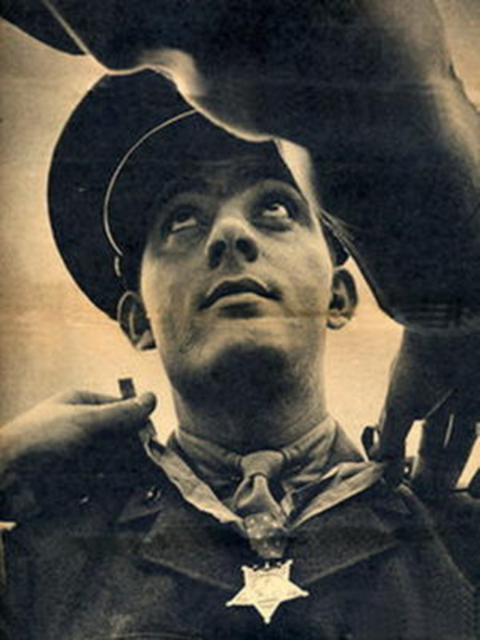Medal of Honor being placed around John Basilone's neck