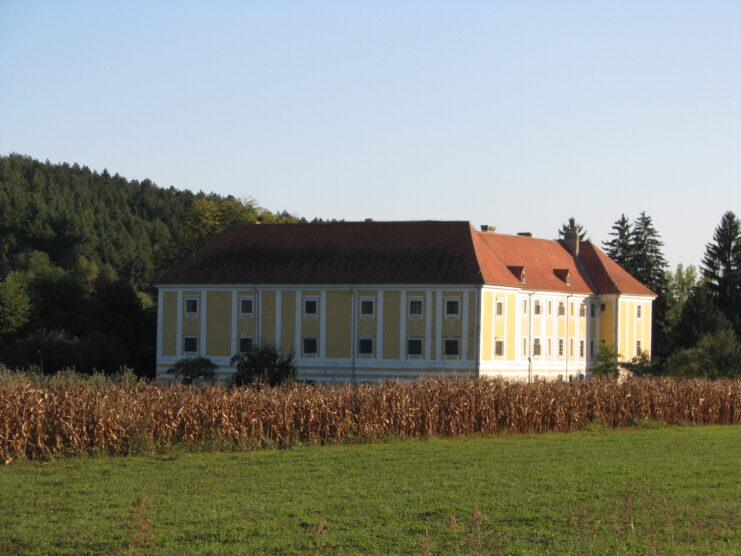 Exterior of the Palace of Keglevich, as seen from the edge of a corn field
