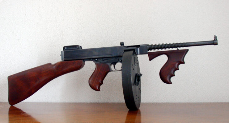 Tommy Gun placed on a wooden table