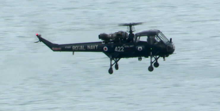 Westland Wasp flying over water